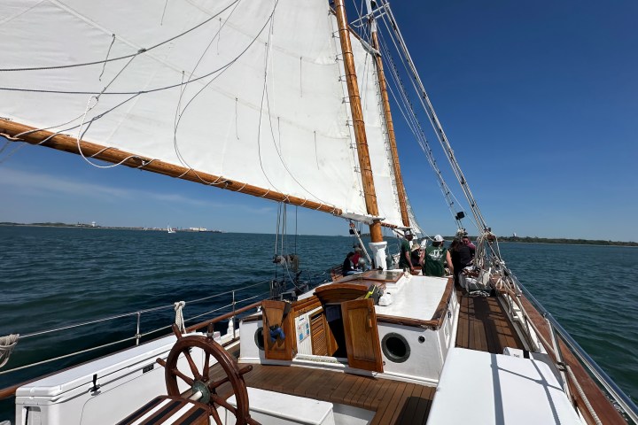 a wooden boat in a body of water